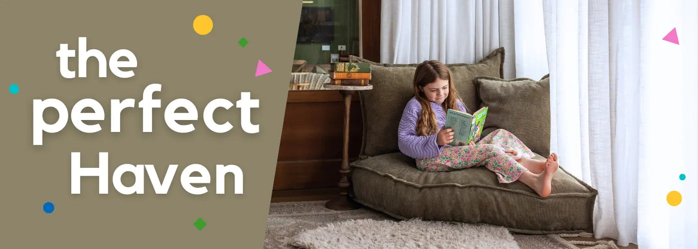 Girl in reading nook with Haven floor cushion